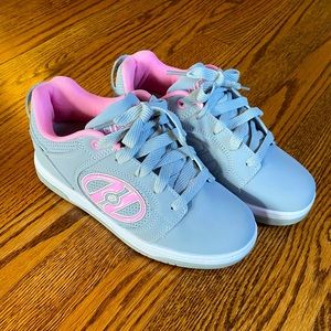 Youth size 4 (women size 5) Heely’s wheeled shoes. Brand new, never worn